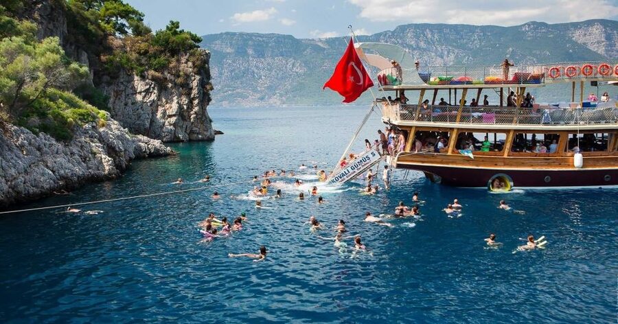 Marmaris: Cleopatra Island Boat Trip with Lunch and Transfer - Lunch on board and soft drinks: what’s included and how it lands