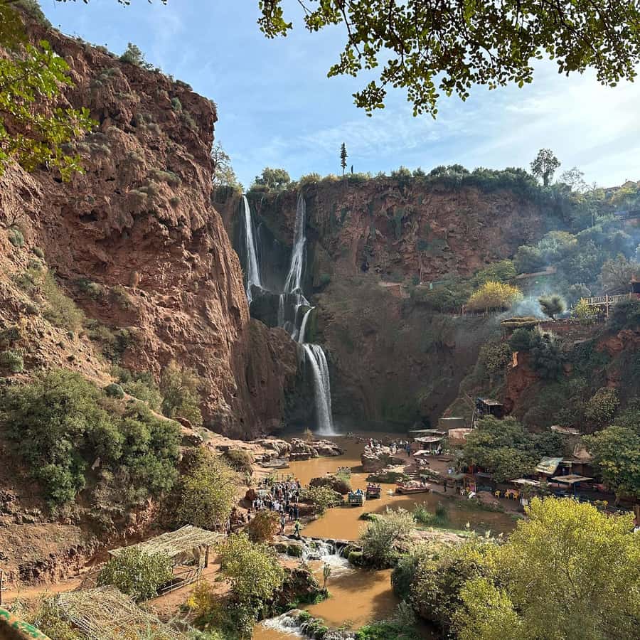 Marrakech to Ouzoud waterfalls day tour - Guide & boat ride - The hike to the base: 110m waterfalls, rainbow light, and orange juice stops