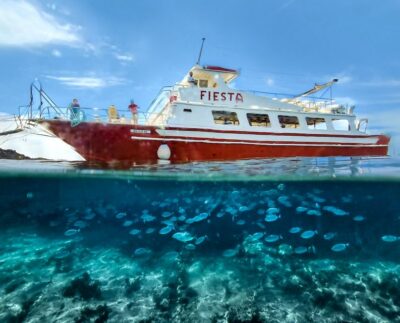 Menorca: Full-Day Boat Tour with Paella Lunch - Cala en Turqueta: your first long beach stop and lunch rhythm