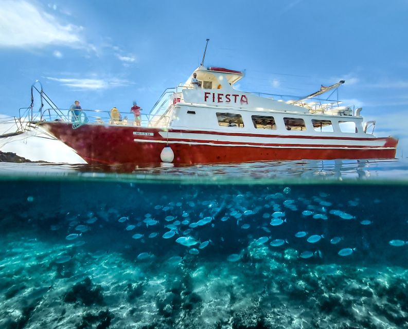 Menorca: Full-Day Boat Tour with Paella Lunch - Cala en Turqueta: your first long beach stop and lunch rhythm