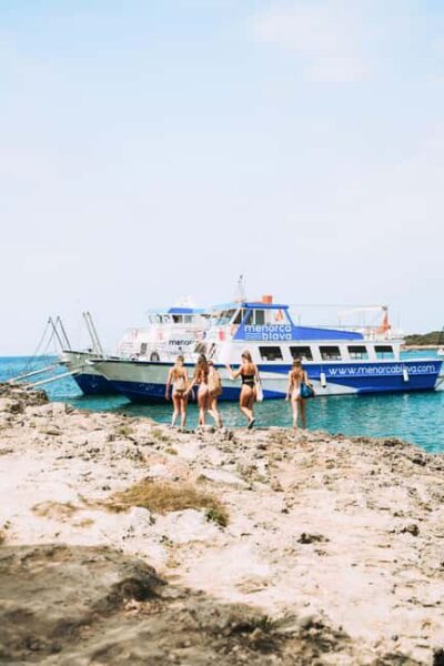 Menorca: Natural Coves and Beaches Boat Trip & Paella Lunch - Getting to Passeig des Moll and settling in on the boat