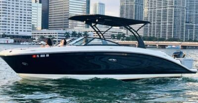 Miami: Guided Boat Tour with Champagne - The Boat Itself: 30-Foot Comfort, Showers, and Real Music