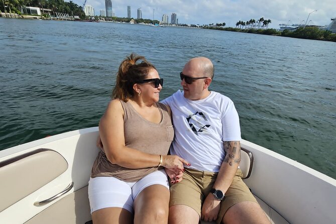 Miami Shared Boat tour, 2 hours on a 24 ft boat. 6 people total. - Route Highlights: Miami River to Biscayne Bay Skyline