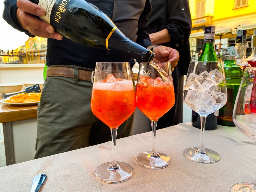 Milan: Navigli District Canal Boat Tour with Aperitivo - Darsena di Milano and Naviglio Pavese: quick photo stops