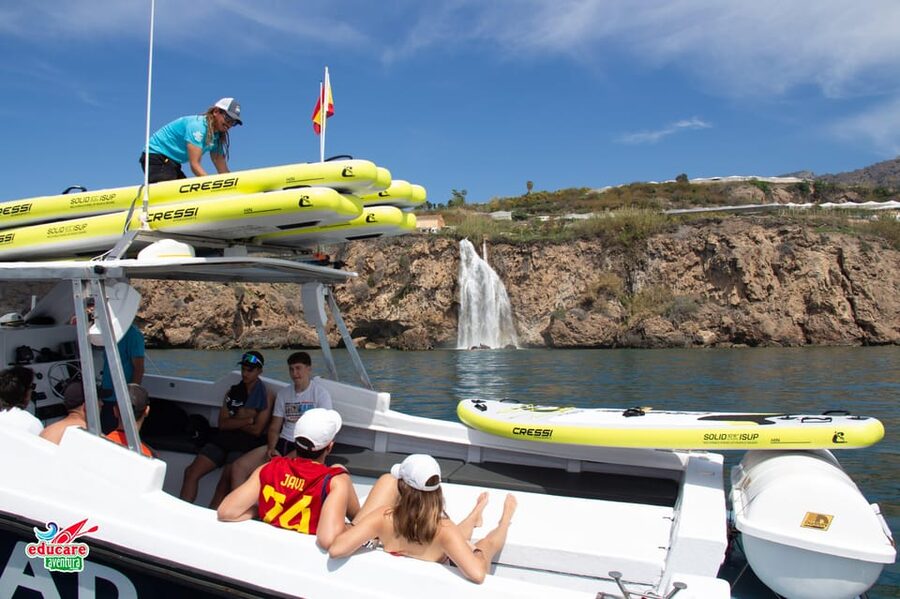 Nerja: Maro Waterfall Boat Trip with Paddleboarding & Drink - Snorkeling stops in clear coves: what to expect in the water