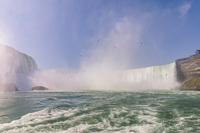 Niagara Falls Tour with Boat Ride & Journey Behind the Falls - Niagara City Cruises: descending 19 stories and getting close to the falls