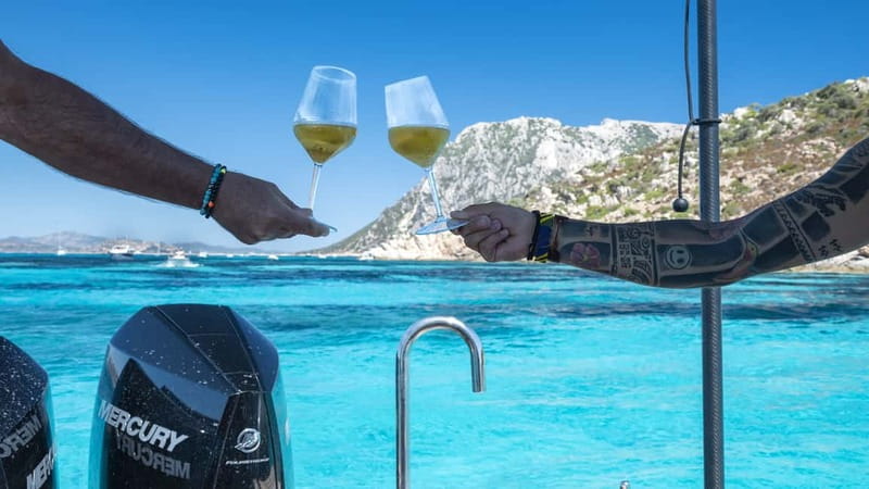 Olbia: Boat tour to Tavolara Park with Aperitif and Drinks - Aperitif and drinks onboard: what’s included and what it feels like