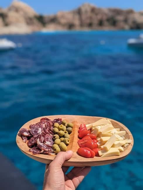 Olbia: Dolphin Watching & Snorkeling Boat Trip - Practical Tips: Meeting Point, What to Bring, and Common Friction