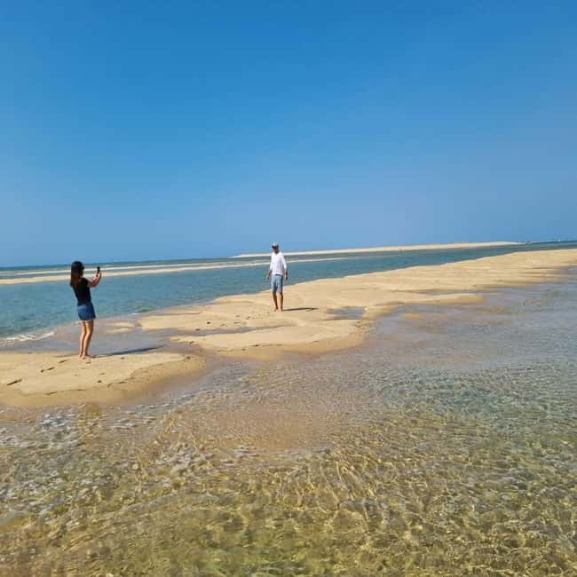 Olhão: Ria Formosa 2 Islands Boat Tour - Finding Kioske Rota Das Ilhas and settling in on board