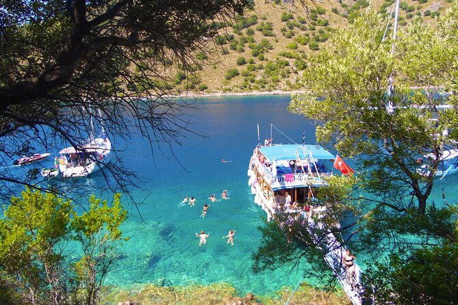 Ölüdeniz: Butterfly Valley Boat Trip with Buffet Lunch - Butterfly Valley: cliffs, swimming time, and the butterfly season reality