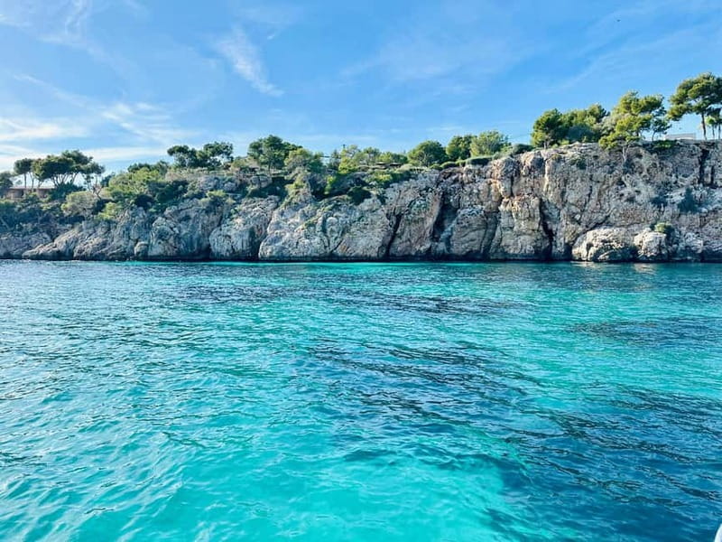 Palma de Mallorca: Private Boat Tour with Snorkel and Paddle - Cala Comtesa and Punta Negra: the anchorage experience up close