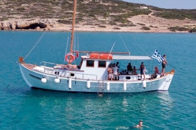 Paros Half Day Boat Tour from Naoussa port and Bay . - What you get on board: snorkels, wine, and a ladder that works