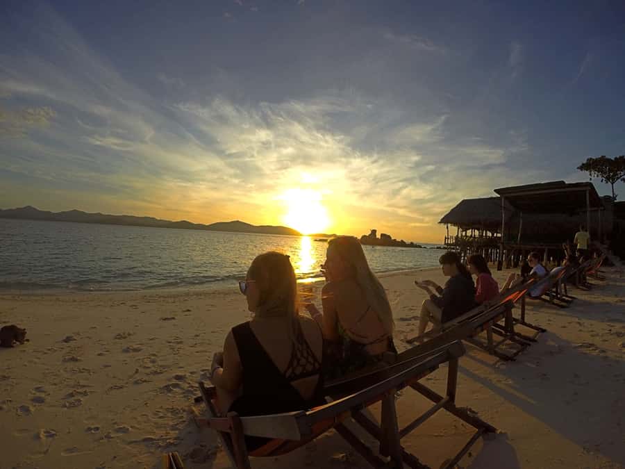 Phuket: Phi Phi Sunrise Boat Tour to Bamboo and Khai Island - Khai Nai Island sunrise breakfast: shallow water, calm photos, and a real start
