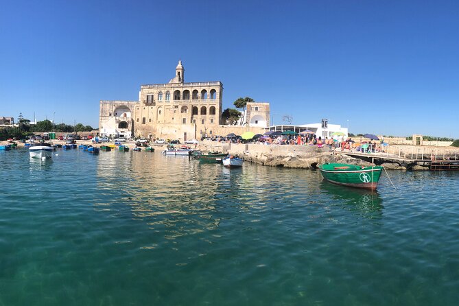 Polignano a Mare boat tour emotions, caves, diving and appetizers - Grotta Azzurra: those skylights that turn the cave into blue theater