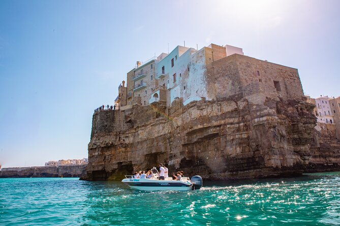 Polignano a Mare: Boat Tour of the Caves - Small Group - Grotta Palazzese from the water: seeing a cave restaurant’s setting