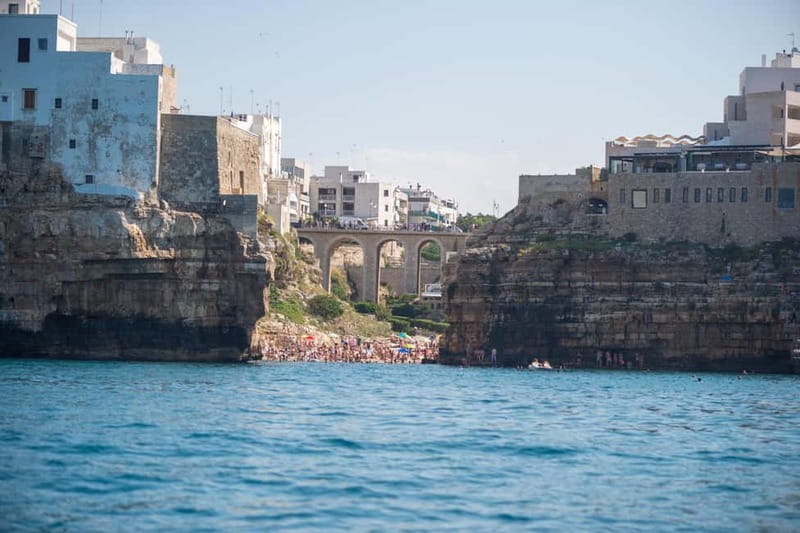 Polignano a Mare: Eco Boat Tour with Snorkeling and Caves - Domenico Modugno monument stop: the land-to-sea connection