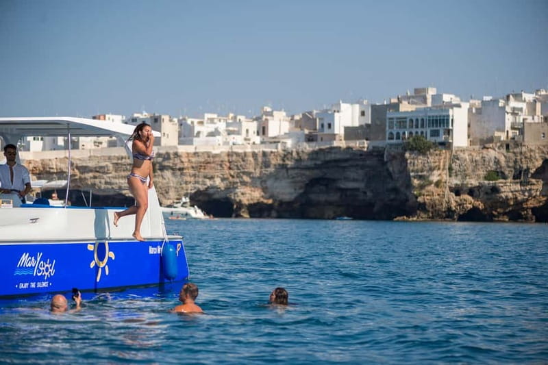 Polignano a Mare: Eco Boat Tour with Snorkeling and Caves - Lama Monachile Beach and the cliff-side approach