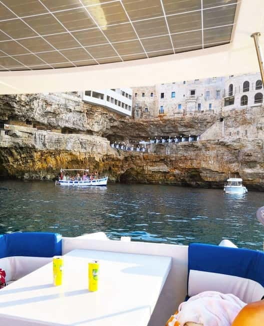 Polignano a Mare: Eco Boat Tour with Snorkeling and Caves - Hermit’s Rock: a classic Polignano silhouette