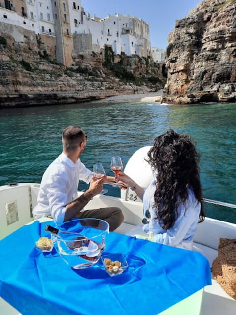 Polignano's coast and caves: a boat tour with drinks, swimming, music, and fun - Swimming and snorkeling: gear, safety, and how the water break feels