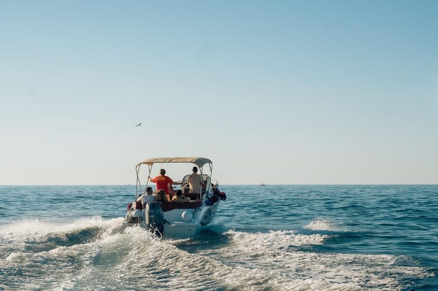 Polignano Sea Caves: Boat Tour with Snorkeling & Aperitif - Lama Monachile and the Polignano cliffs that look almost unreal