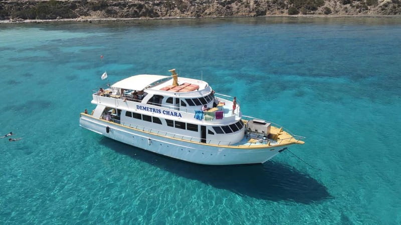 Polis: Blue Lagoon Boat Tour with Optional Barbecue Lunch - From Paphos District to Latsi Harbor: How You Start