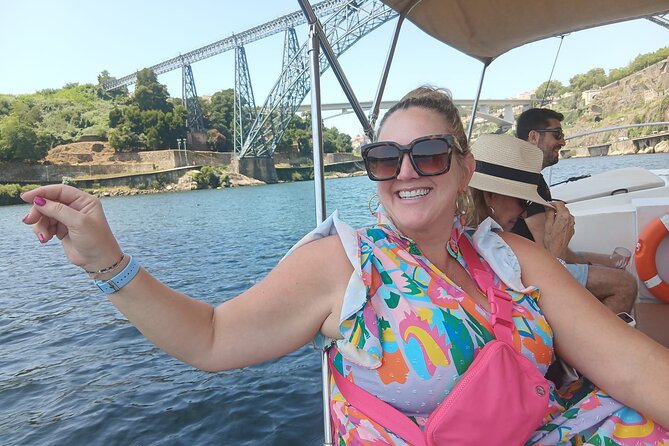 Porto:Douro River boat tour under the 6 bridges - Price check: $44.76 for port, snacks, and bridge views