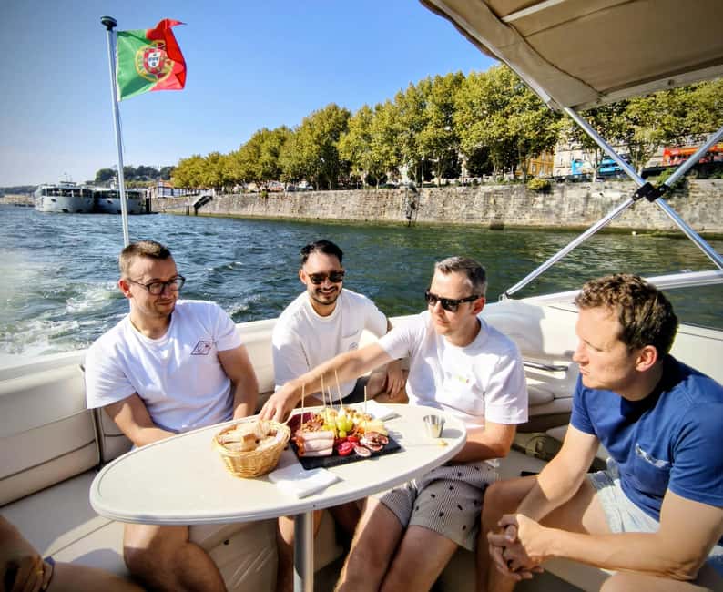 Porto: Douro River Cruise & Boat Tour with Port Wine Tasting - Port wine tasting from the water: included glass, optional snacks