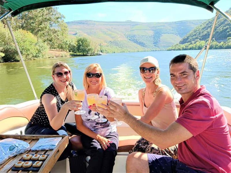 Porto: Douro Valley, 2 Wineries, Lunch & Private Boat Trip - Lunch at a wine producer’s farm: fire-cooked food that actually fills you up
