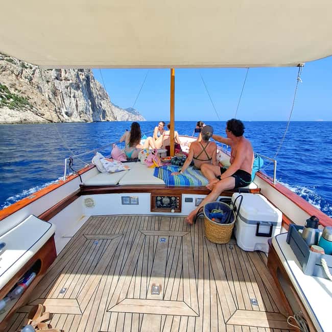 Porto San Paolo: Half Day Boat Tour to Tavolara and Molara - The boat setup: shade, ladder access, and space that matters