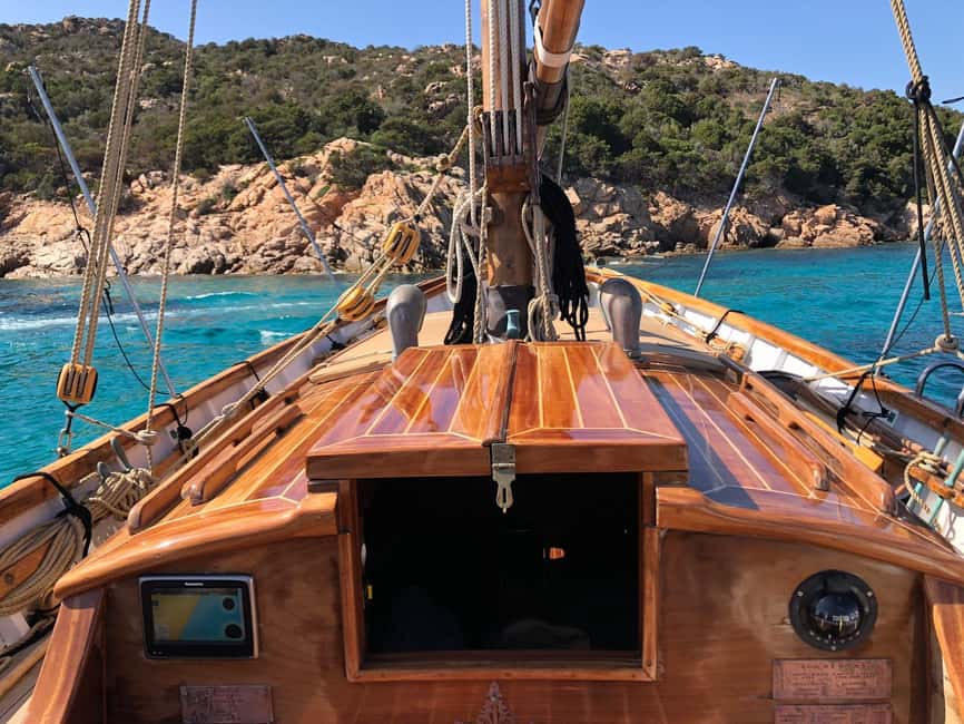 PortoS.Paolo: Half Day Traditional Boat Tour Tavolara Molara - Stop 2: Tavolara island shore time (and the one simple walking tip)