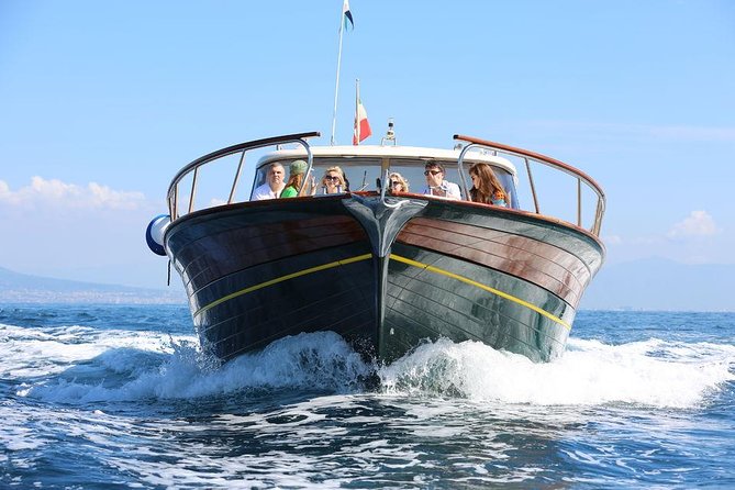 Positano & Amalfi Boat Tour from Sorrento: Swim & Light Lunch - Sorrento’s coast starts small—and turns dramatic fast