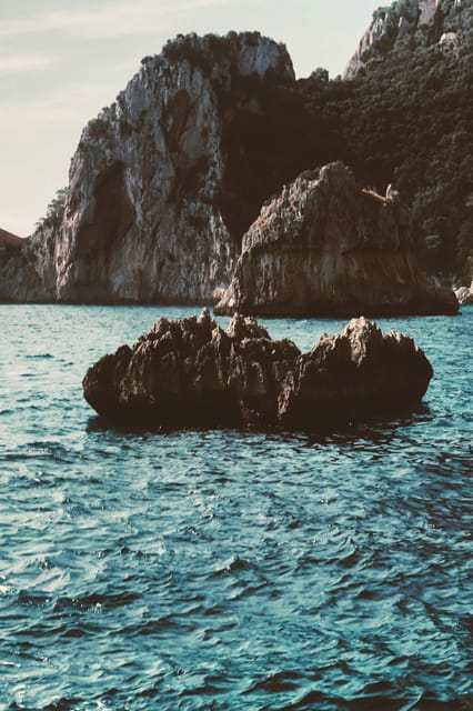Positano: Capri and Blue Grotto Shared Boat Tour with Drinks - Who Should Book This Capri + Blue Grotto Shared Tour