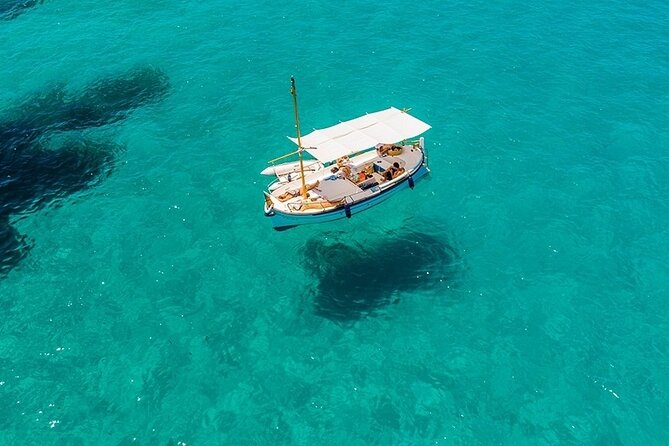 Private 4-hour Mediterranean Boat Tour in Ibiza with Snorkeling - Snorkeling gear, cooler for BYO drinks, and paddle surf included