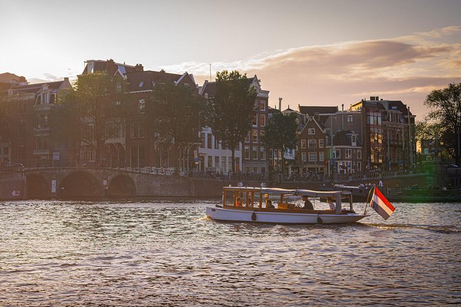 Private Boat Tour Amsterdam - 90 Min incl. welcome drink on historic saloon boat - Custom commentary: history, culture, and what you ask for
