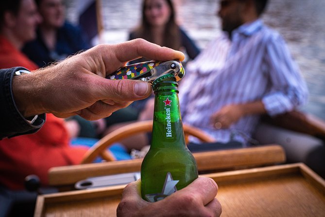 Private Boat Tour Amsterdam - 90 Min incl. welcome drink on historic saloon boat - How much it costs, and when it feels like real value