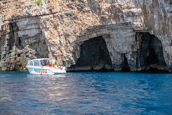 Private Luxury Boat tour for 12 from Split, Brac, Trogir, Hvar - Komiža Harbour on Vis: a real break from the water