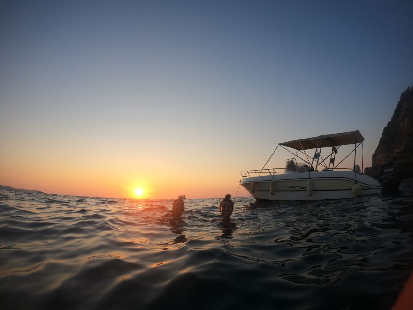 Procida: Boat Tour with Swimming Stops and Underwater Photos - First Coast Views: Passing Palazzo d’Avalos From Sea Level