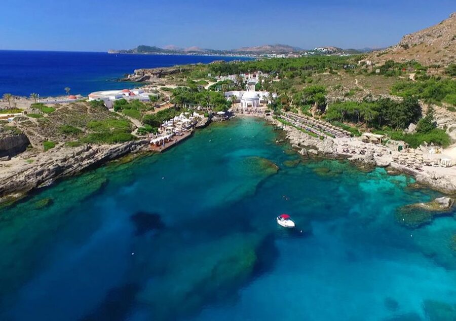 Rhodes Town: Fishing Boat Trip with Fish Meal and Swim Stops - Swim stop and snorkeling in a secluded cove