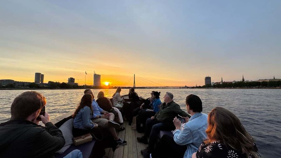 Riga: Canal Boat Tour with Welcome Drink & Audio Guide - Downstream on the Daugava: Bridges, Castle Area, and the Other Side of Riga