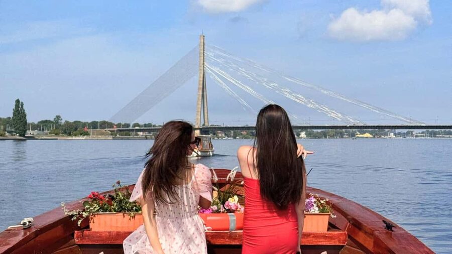 Riga: Canal Boat Tour with Welcome Drink & Audio Guide - Weather and Route Changes: Plan for Wind Off the Water