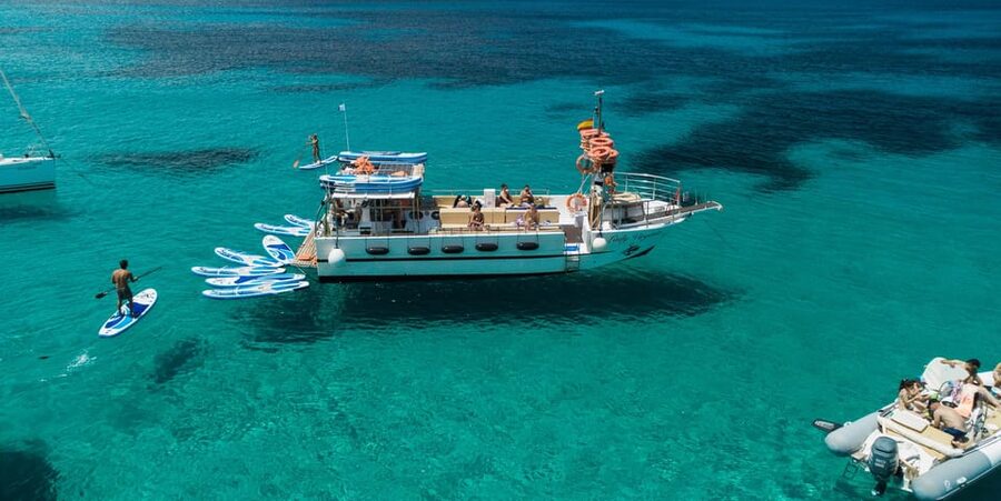 San Antonio: Cala Bassa, Cala Conta and Cave Boat Trip - Water activities: how to get the most from snorkeling and paddle surf