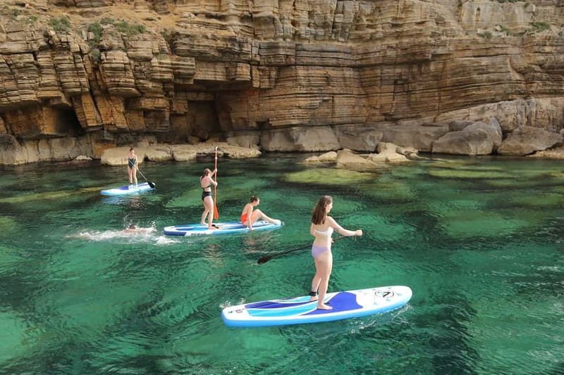 San Antonio: Cala Bassa, Cala Conta and Cave Boat Trip - Crew and guide energy: why the boat feels easygoing