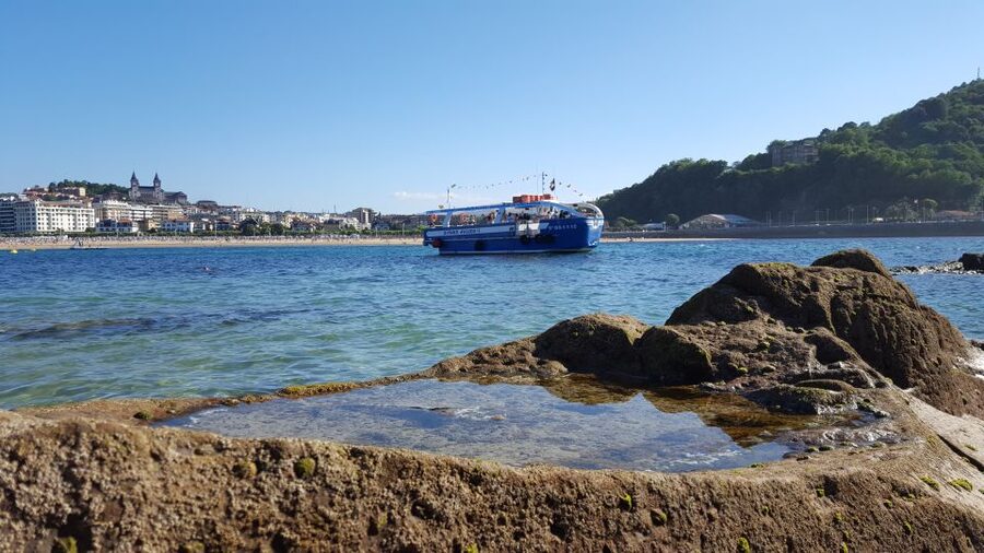 San Sebastian: Boat Tour with Stop at Santa Clara - Who should book this boat tour with Santa Clara stop?