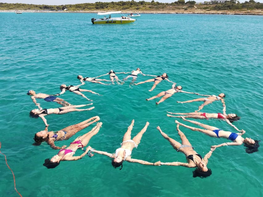 Sant'Andrea Island Boat Tour with aperitif on board - Stop 1: Sant’Andrea Island for snorkeling and a real swim break
