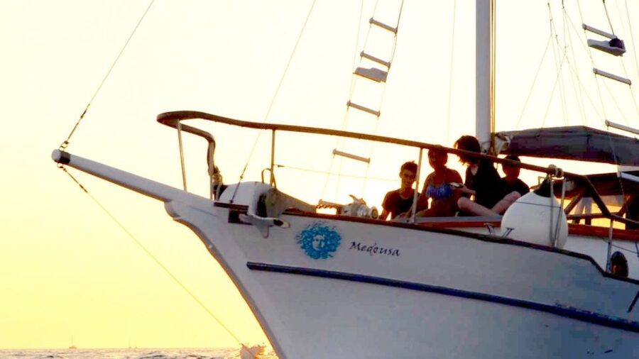 Santorini: Traditional Wooden Boat Tour with Meal and Wine - Key points I’d build my day around