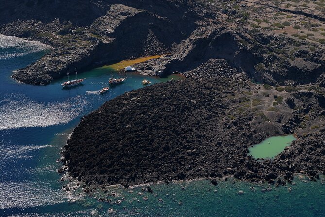 Santorini - Volcano and Hot springs Boat Trip with Bus Transfer - Stop 2: Nea Kameni Hot Springs Swim in 30–35°C Water