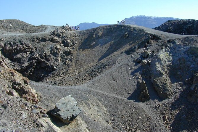 Santorini - Volcano and Hot springs Boat Trip with Bus Transfer - Stop 1: Erinia Bay and the Volcano Crater Walk