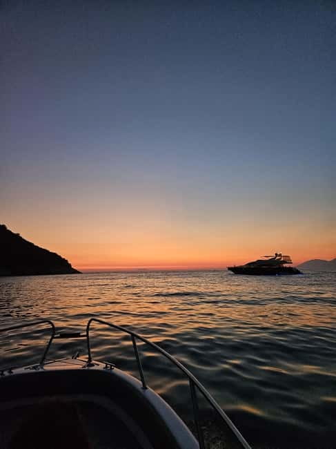 Sarandë: Sunset boat tour with local wine - Sarandë golden hour from a small speedboat