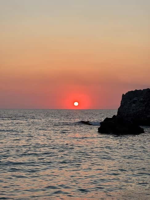 Sarandë: Sunset boat tour with local wine - Secret Beach by boat: the pause you remember