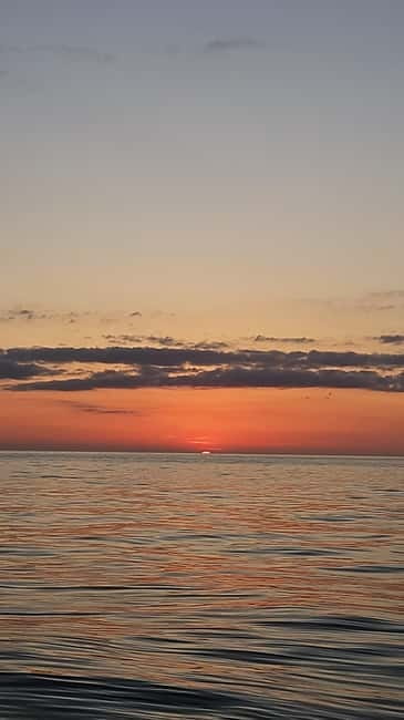 Sarandë: Sunset boat tour with local wine - Wine, music, and the sail into the last glow